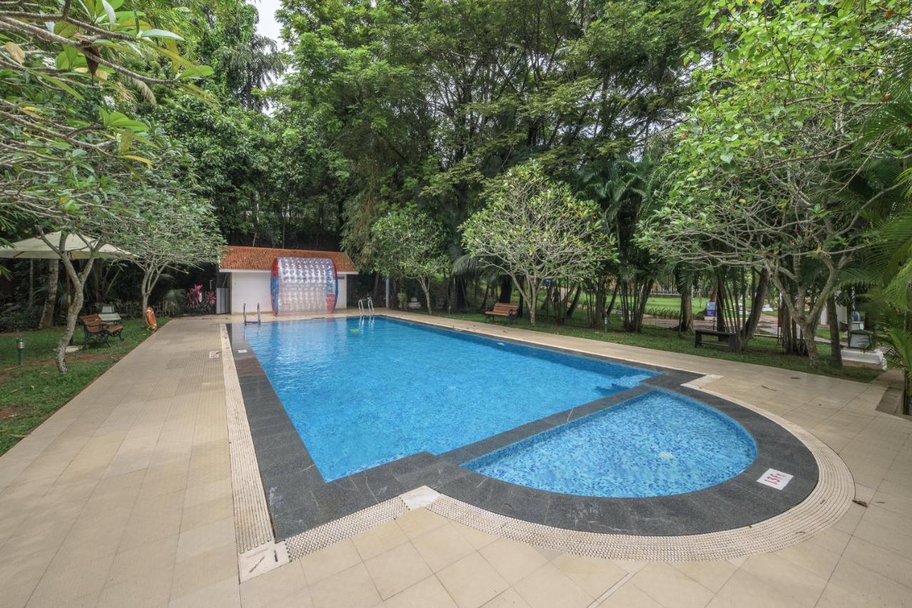 Club Mahindra Ashtamudi Hotel Nīndakara Buitenkant foto